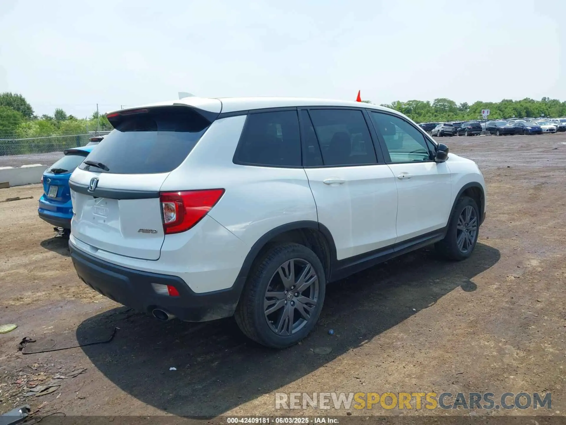 4 Photograph of a damaged car 5FNYF8H59MB007097 HONDA PASSPORT 2021