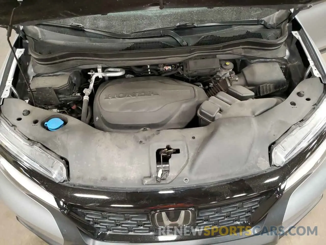 12 Photograph of a damaged car 5FNYF8H92MB016307 HONDA PASSPORT 2021