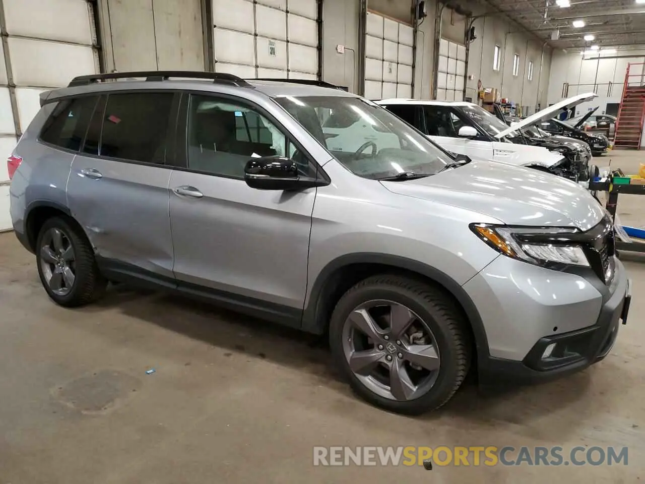 4 Photograph of a damaged car 5FNYF8H92MB016307 HONDA PASSPORT 2021