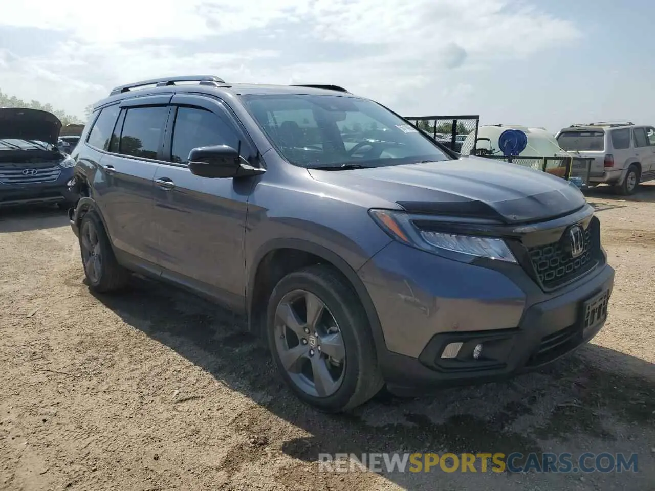 4 Photograph of a damaged car 5FNYF8H92MB038999 HONDA PASSPORT 2021