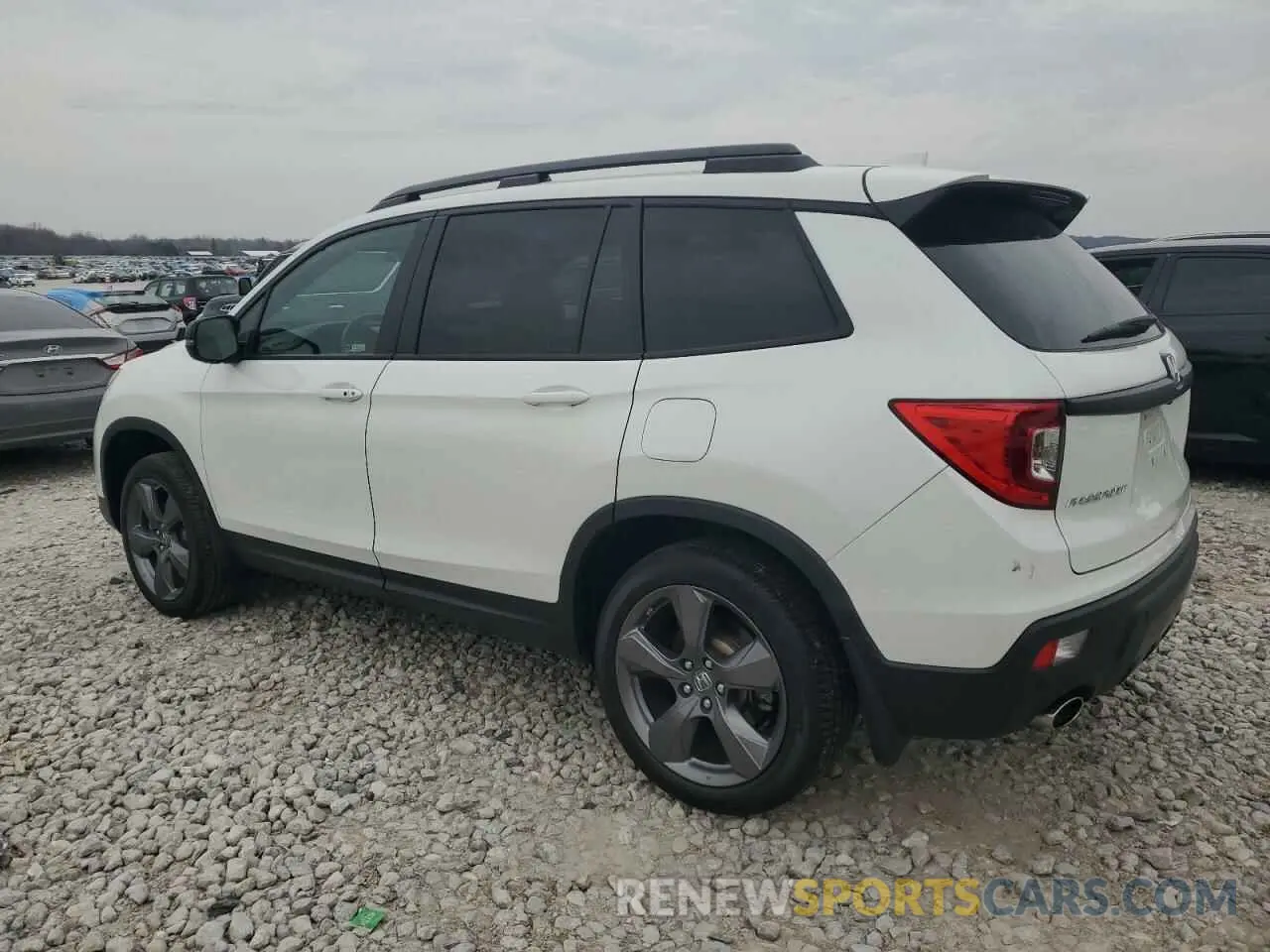 2 Photograph of a damaged car 5FNYF8H94MB001856 HONDA PASSPORT 2021