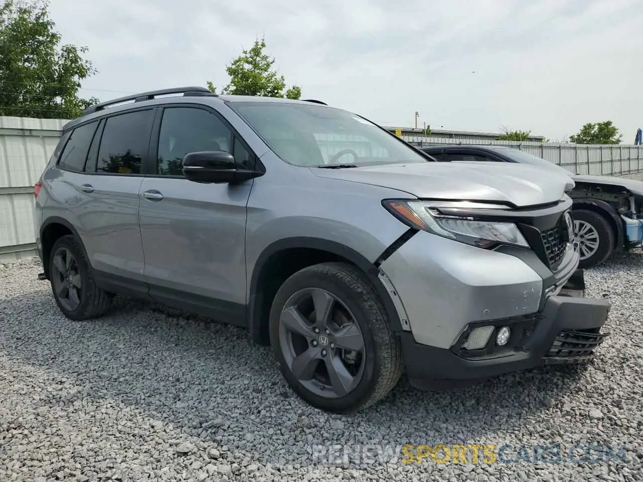 4 Photograph of a damaged car 5FNYF8H95MB040147 HONDA PASSPORT 2021