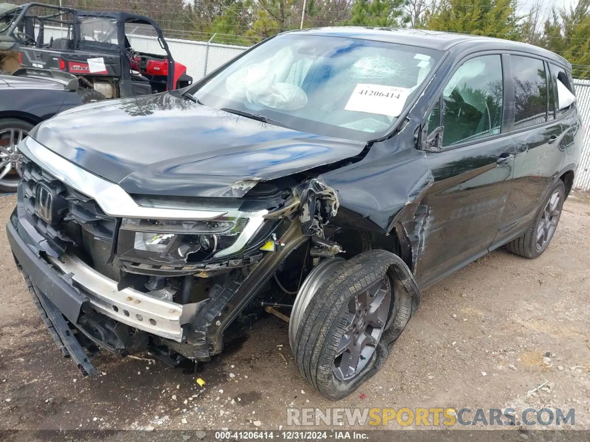12 Photograph of a damaged car 5FNYF7H51NB000270 HONDA PASSPORT 2022