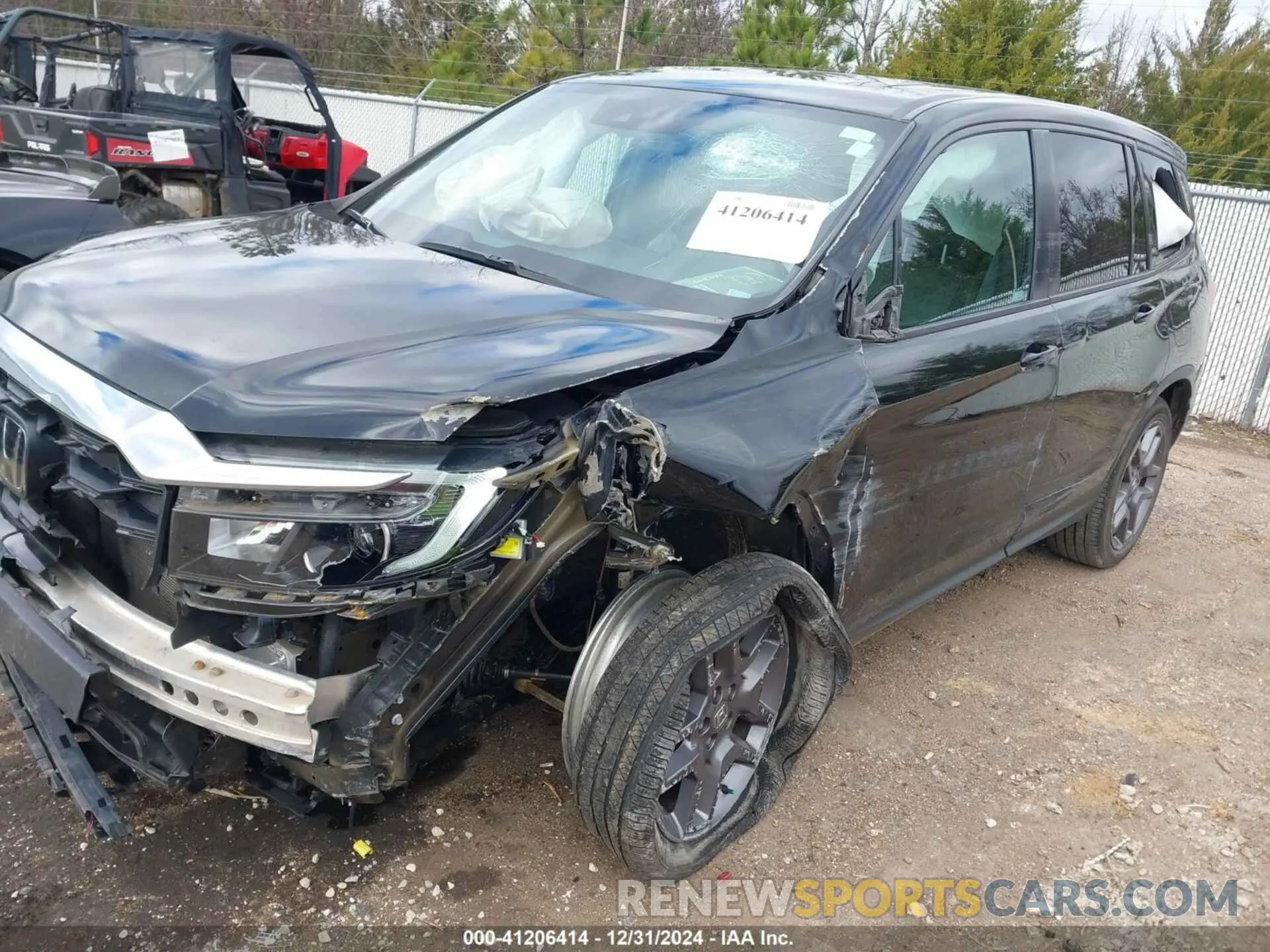 6 Photograph of a damaged car 5FNYF7H51NB000270 HONDA PASSPORT 2022