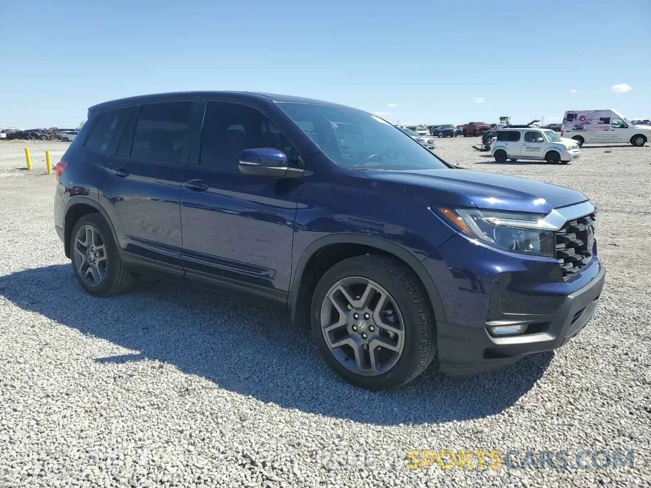 4 Photograph of a damaged car 5FNYF7H51NB002827 HONDA PASSPORT 2022