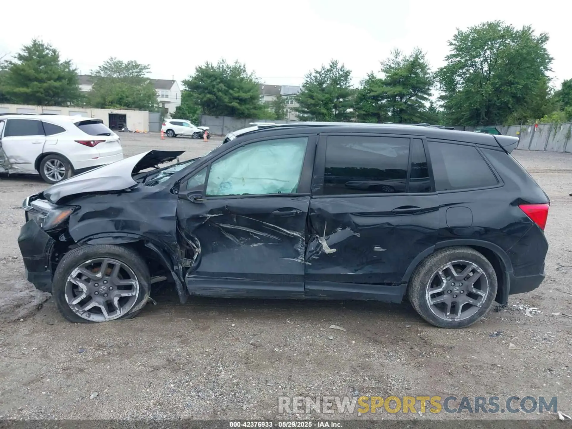 14 Photograph of a damaged car 5FNYF7H53NB003316 HONDA PASSPORT 2022