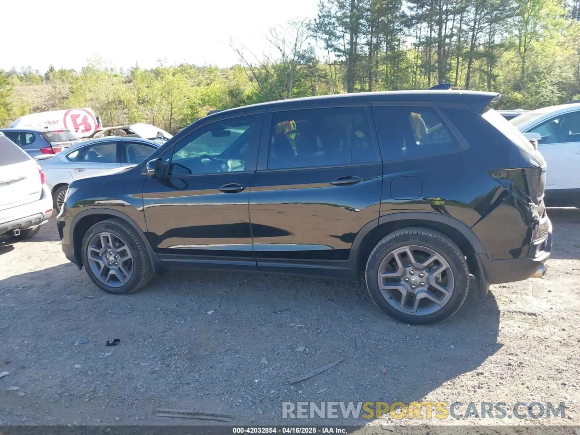 14 Photograph of a damaged car 5FNYF7H57NB004890 HONDA PASSPORT 2022