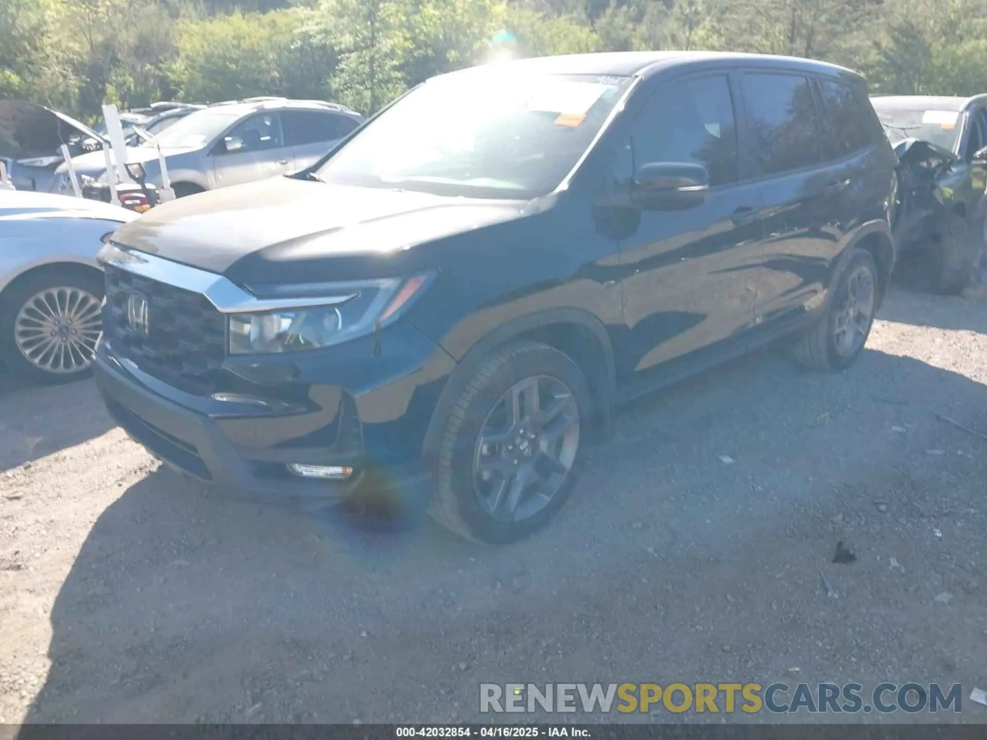 2 Photograph of a damaged car 5FNYF7H57NB004890 HONDA PASSPORT 2022