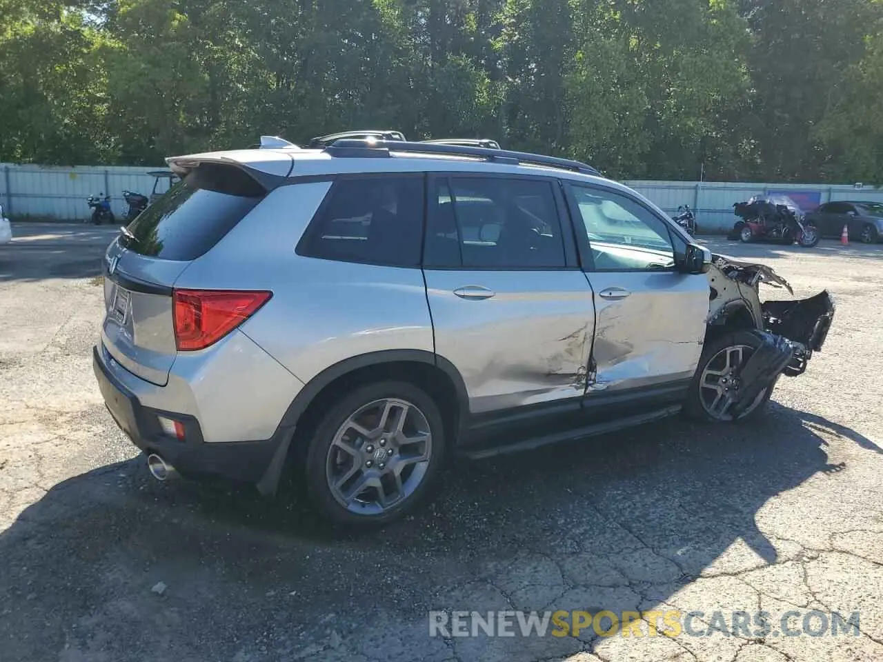 3 Photograph of a damaged car 5FNYF7H59NB003482 HONDA PASSPORT 2022