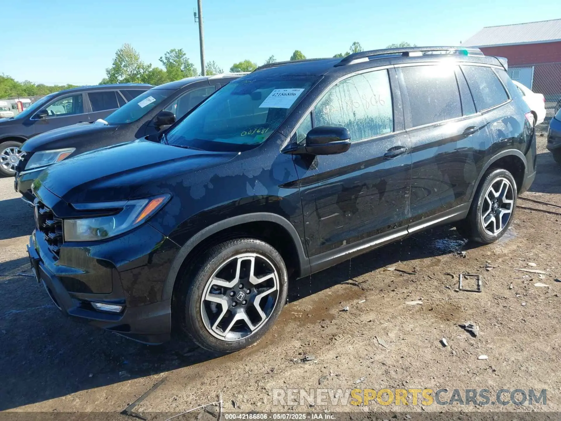 2 Photograph of a damaged car 5FNYF8H01NB003681 HONDA PASSPORT 2022