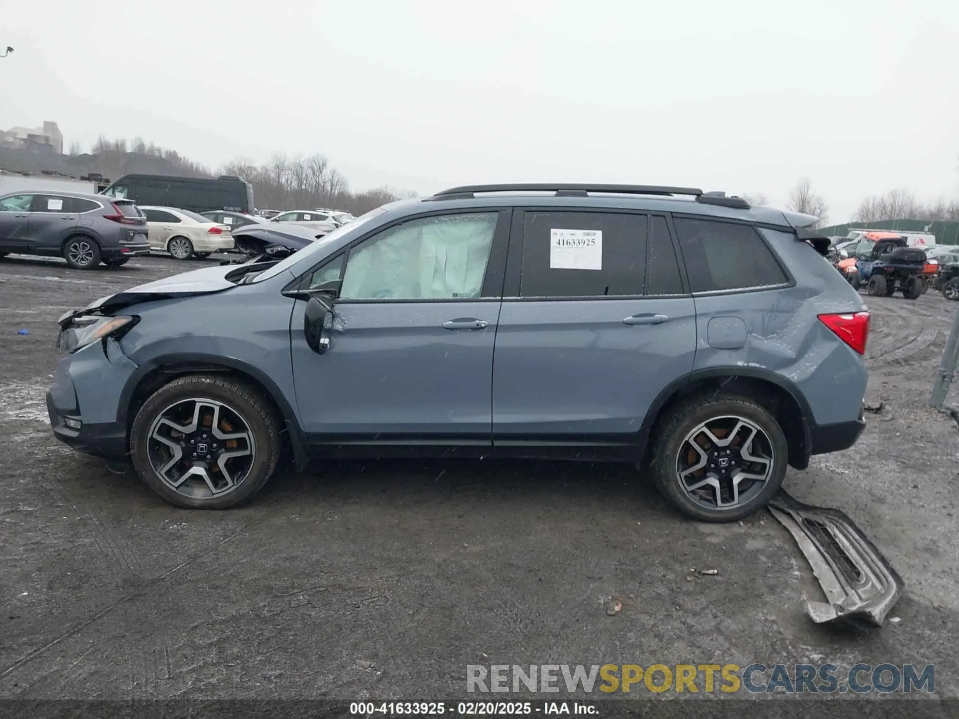 14 Photograph of a damaged car 5FNYF8H06NB015583 HONDA PASSPORT 2022