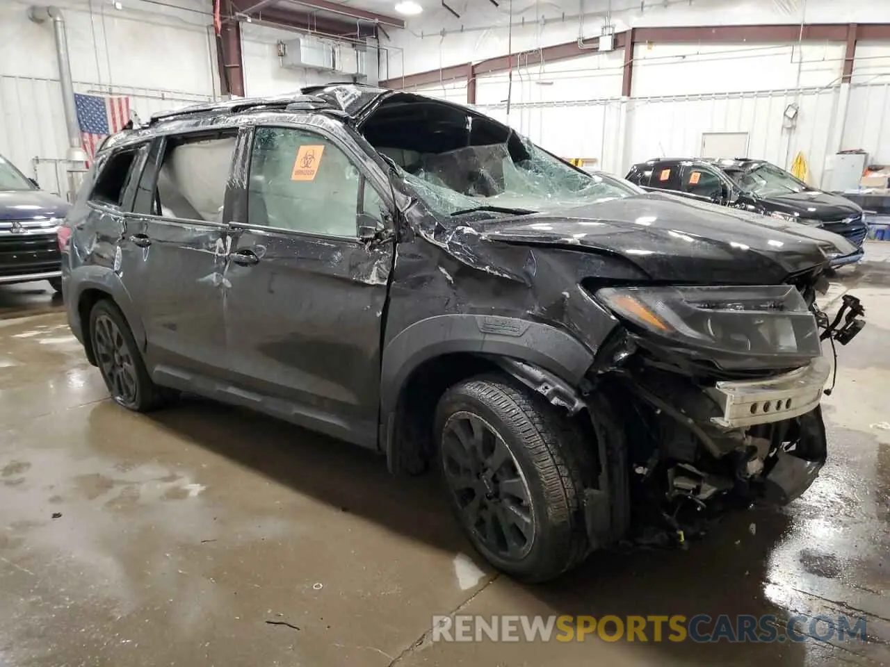 4 Photograph of a damaged car 5FNYF8H07NB008223 HONDA PASSPORT 2022