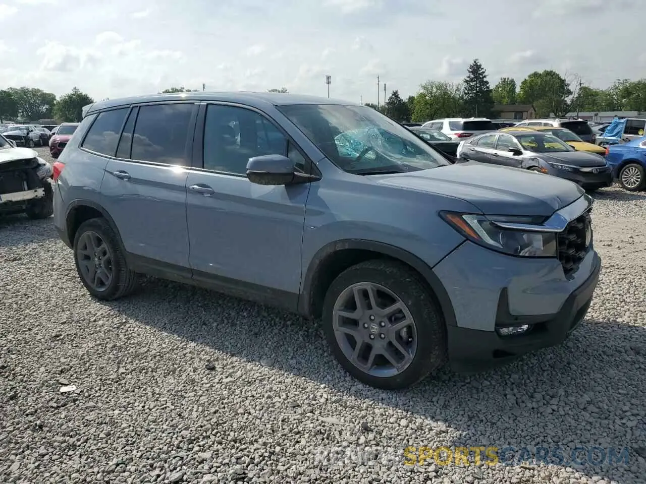 4 Photograph of a damaged car 5FNYF8H52NB031405 HONDA PASSPORT 2022