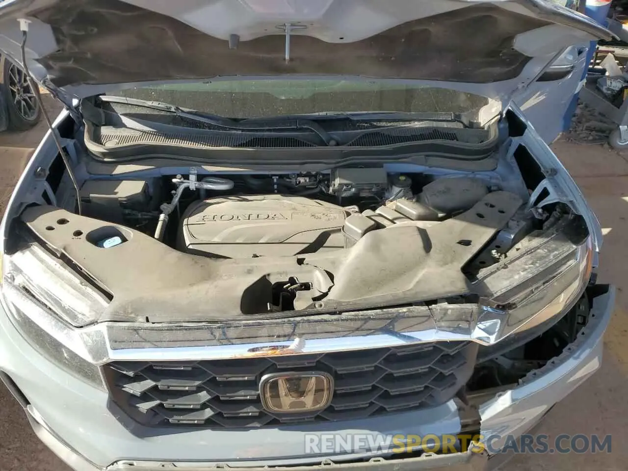 12 Photograph of a damaged car 5FNYF8H53NB007016 HONDA PASSPORT 2022