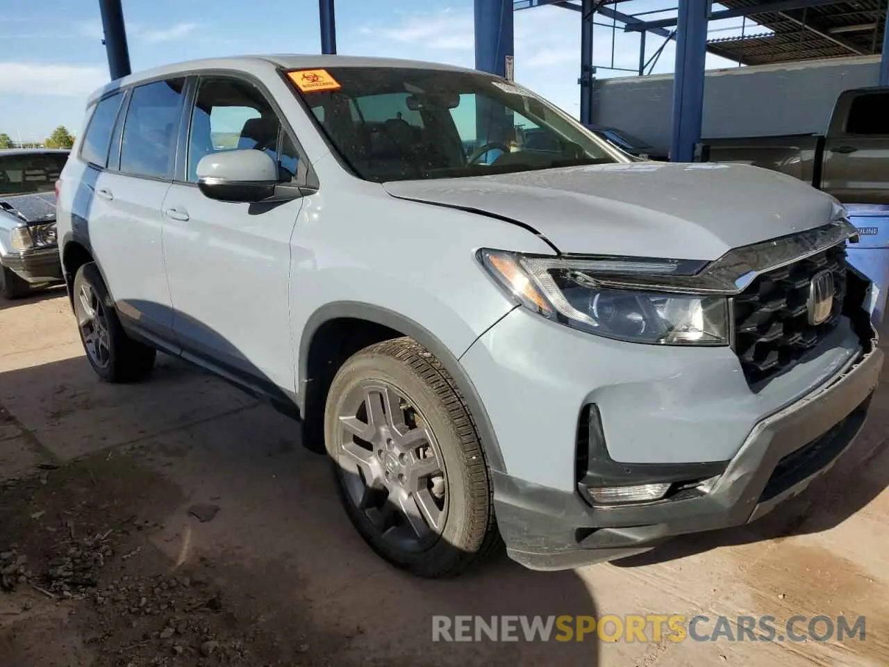 4 Photograph of a damaged car 5FNYF8H53NB007016 HONDA PASSPORT 2022