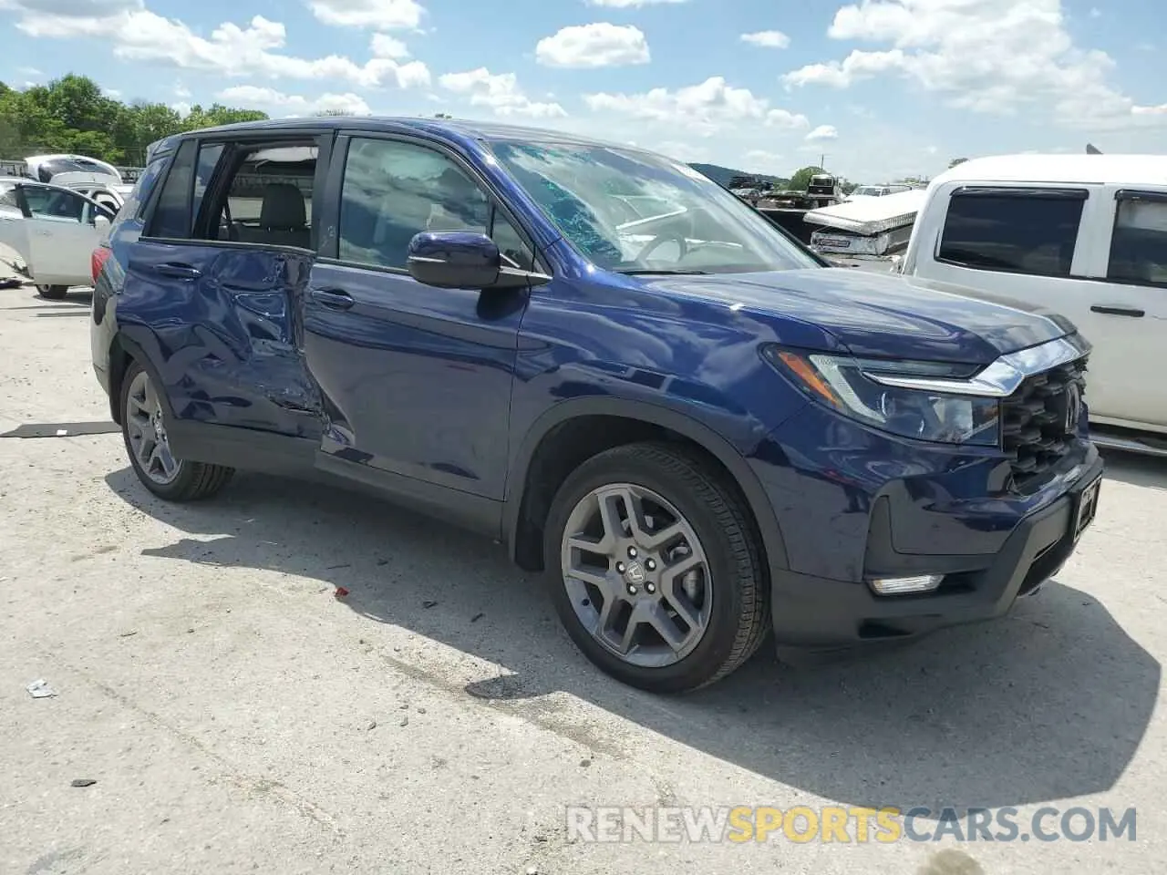 4 Photograph of a damaged car 5FNYF8H53NB029730 HONDA PASSPORT 2022
