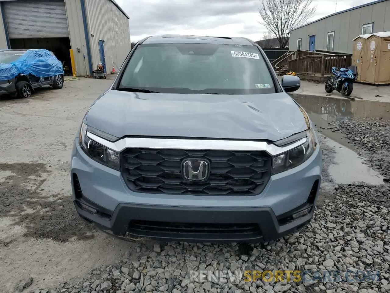 5 Photograph of a damaged car 5FNYF8H54NB003573 HONDA PASSPORT 2022