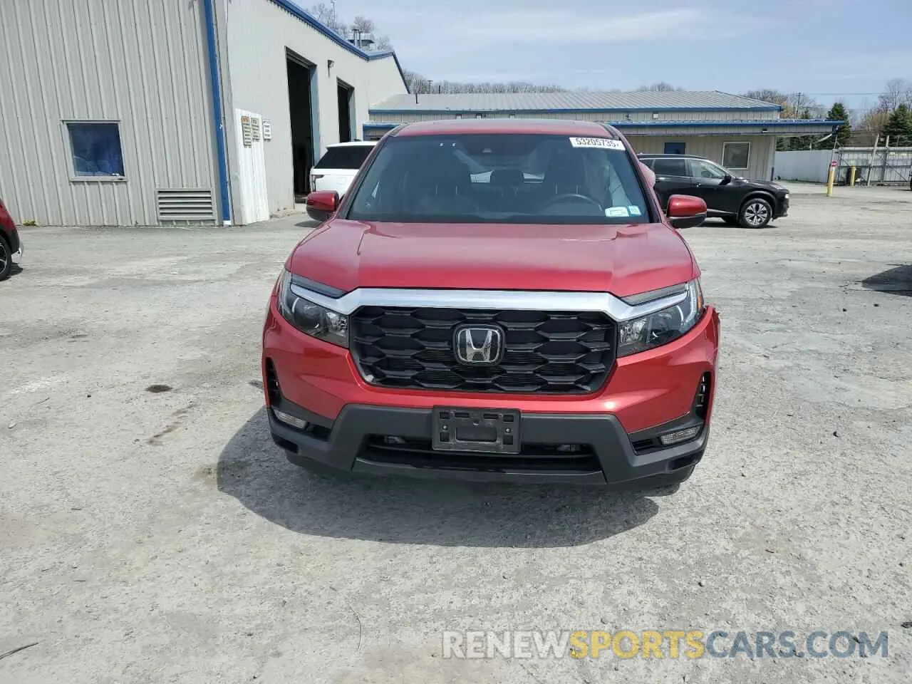 5 Photograph of a damaged car 5FNYF8H59NB021390 HONDA PASSPORT 2022
