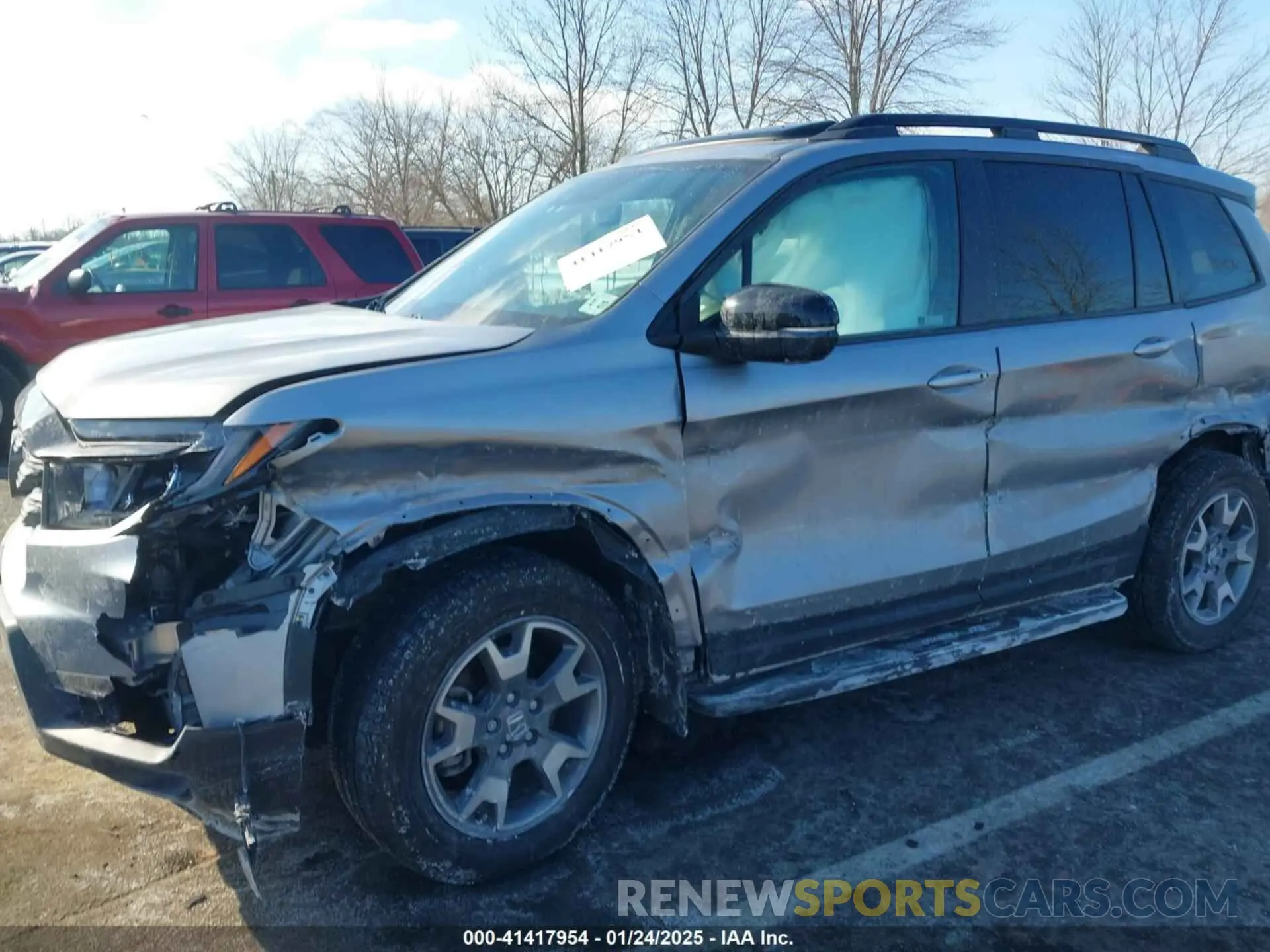 17 Photograph of a damaged car 5FNYF8H61NB000381 HONDA PASSPORT 2022