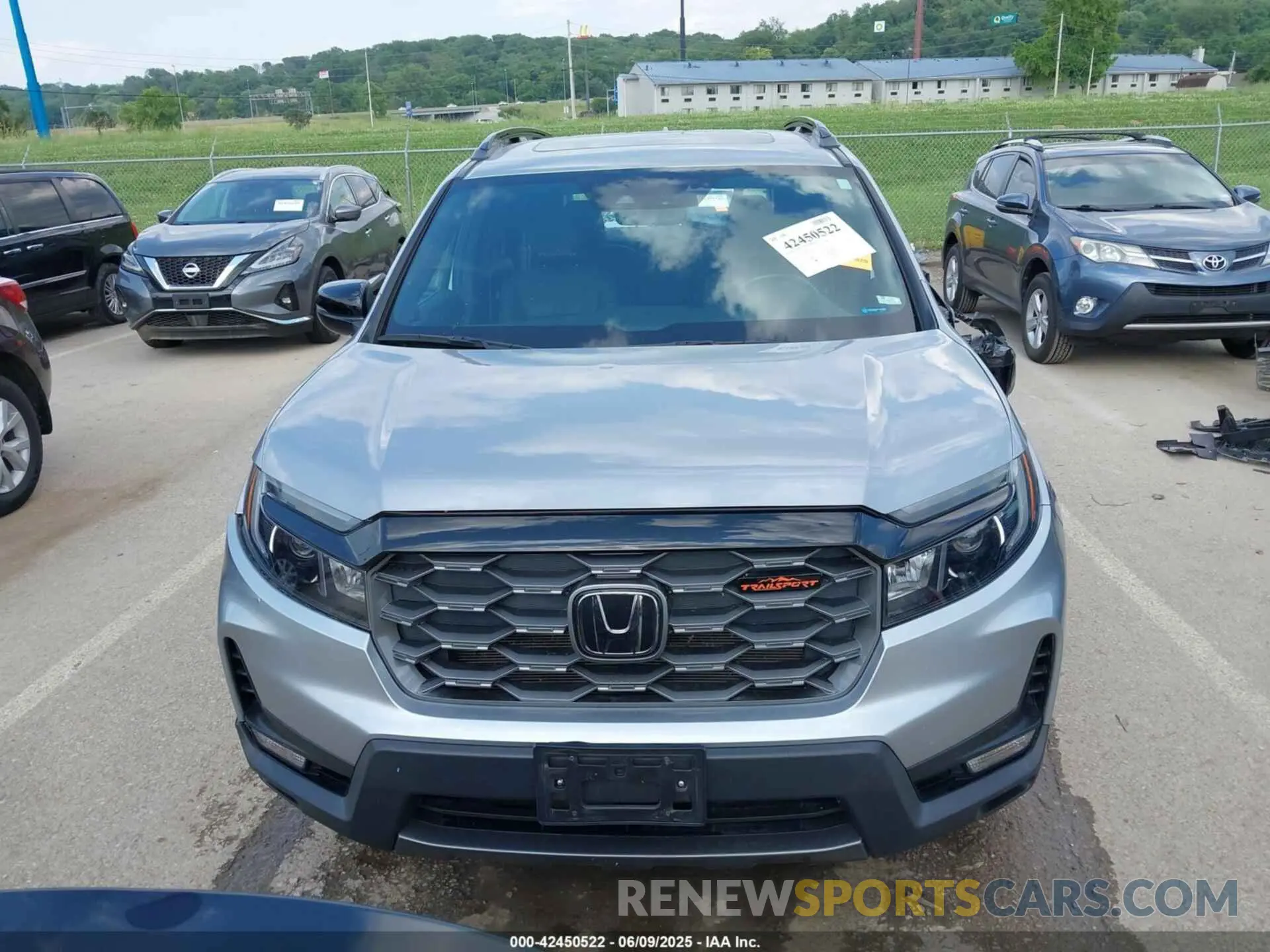 12 Photograph of a damaged car 5FNYF8H63NB004805 HONDA PASSPORT 2022