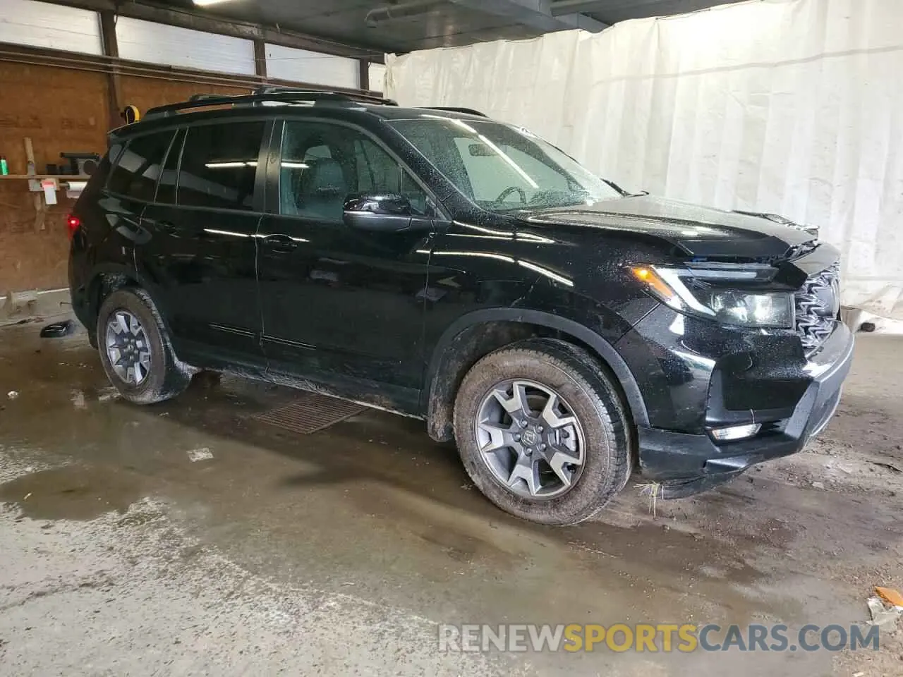 4 Photograph of a damaged car 5FNYF8H63NB009244 HONDA PASSPORT 2022