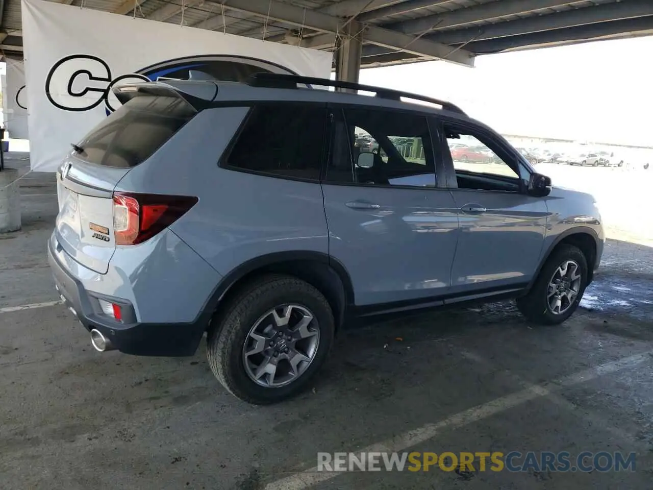 3 Photograph of a damaged car 5FNYF8H69NB029269 HONDA PASSPORT 2022