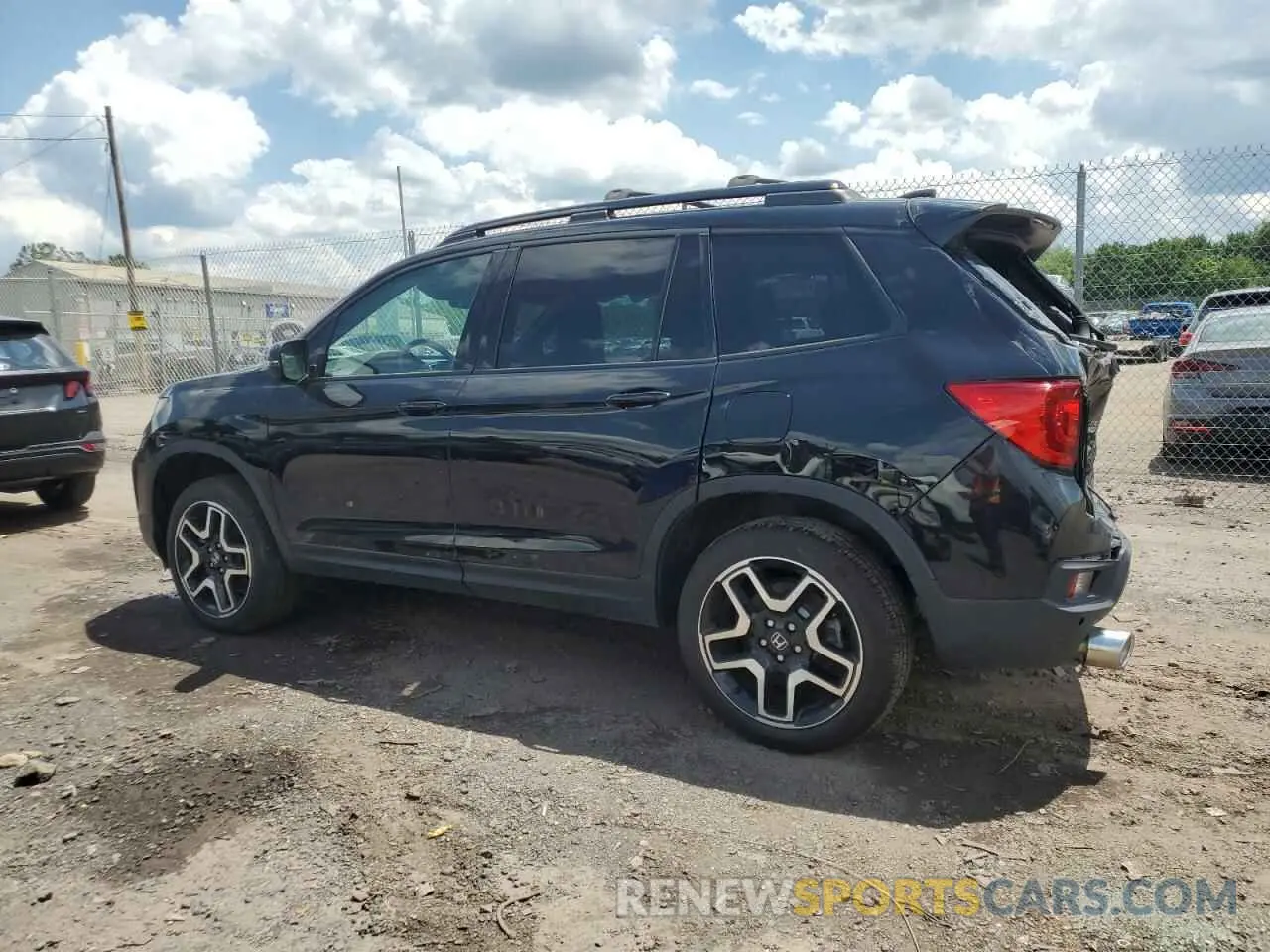 2 Photograph of a damaged car 5FNYF8H01PB030270 HONDA PASSPORT 2023