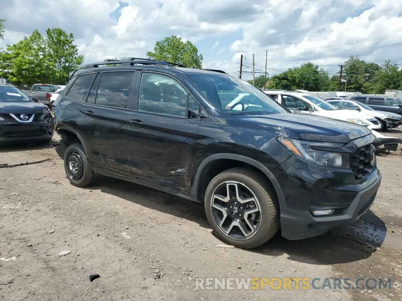 4 Photograph of a damaged car 5FNYF8H01PB030270 HONDA PASSPORT 2023