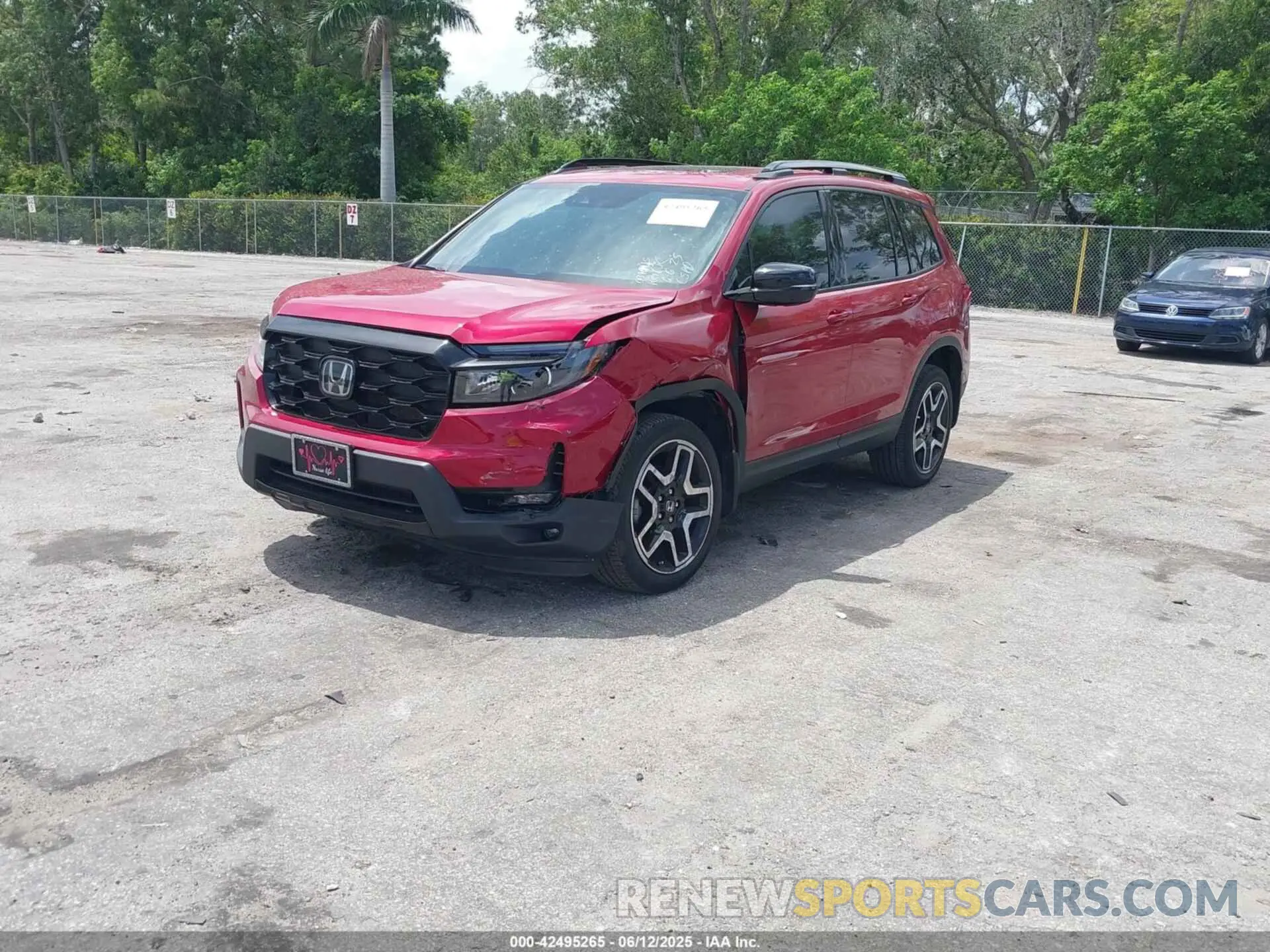 2 Photograph of a damaged car 5FNYF8H01PB031645 HONDA PASSPORT 2023