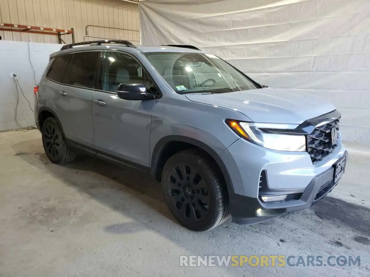 4 Photograph of a damaged car 5FNYF8H03PB034613 HONDA PASSPORT 2023