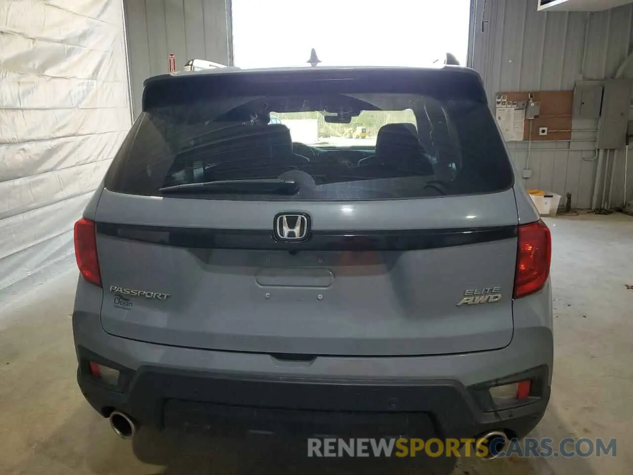 6 Photograph of a damaged car 5FNYF8H03PB034613 HONDA PASSPORT 2023