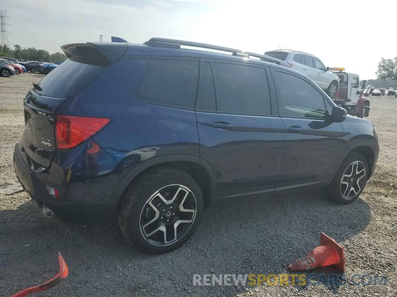 3 Photograph of a damaged car 5FNYF8H04PB014922 HONDA PASSPORT 2023