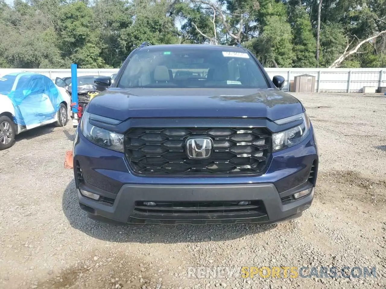 5 Photograph of a damaged car 5FNYF8H04PB014922 HONDA PASSPORT 2023