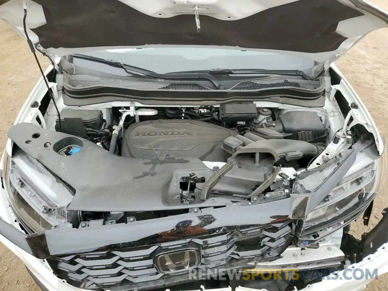 12 Photograph of a damaged car 5FNYF8H05PB013536 HONDA PASSPORT 2023