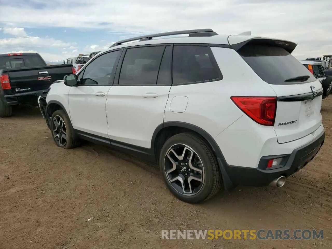 2 Photograph of a damaged car 5FNYF8H05PB013536 HONDA PASSPORT 2023