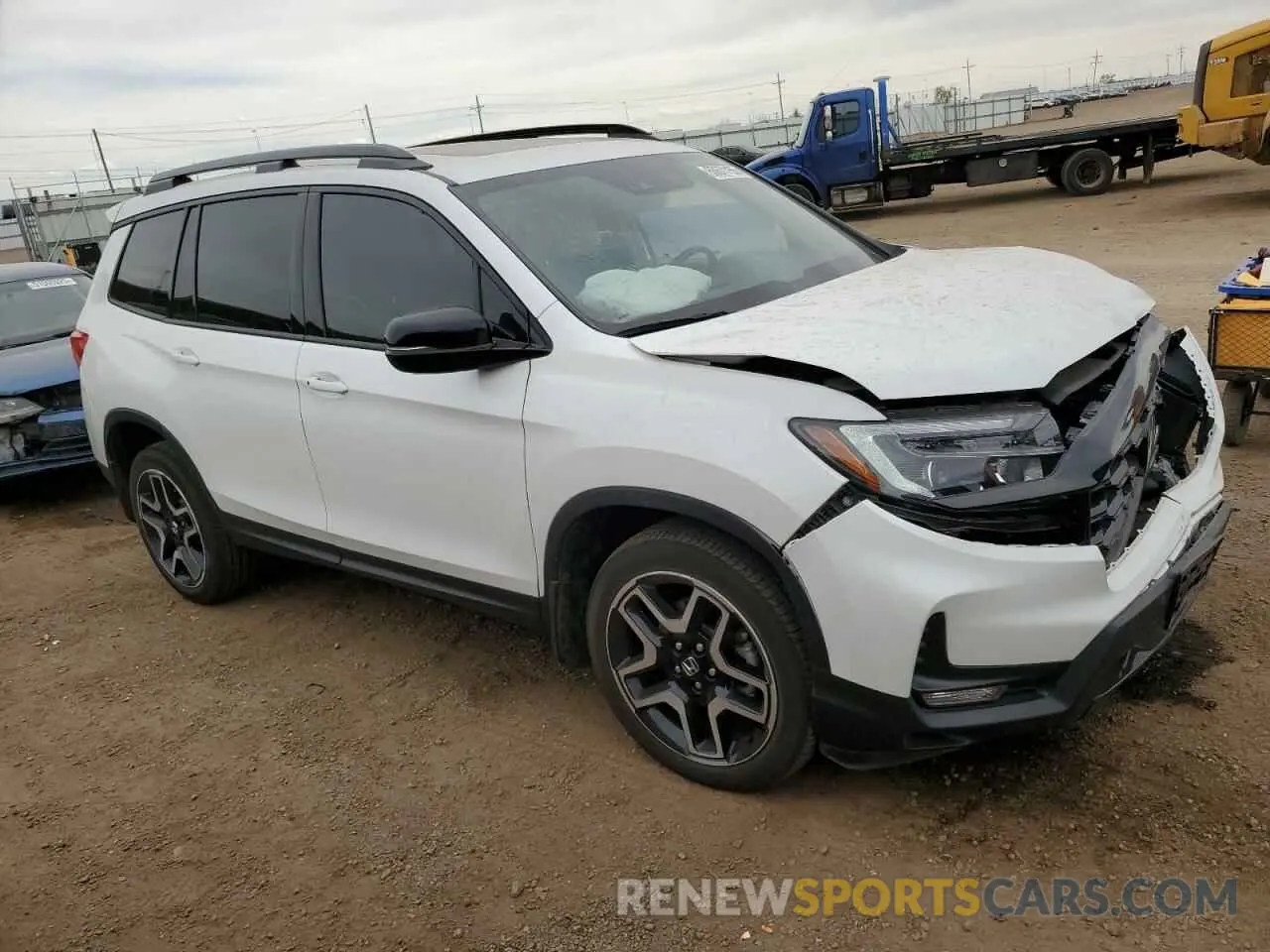4 Photograph of a damaged car 5FNYF8H05PB013536 HONDA PASSPORT 2023