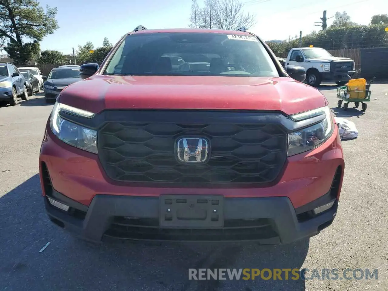 5 Photograph of a damaged car 5FNYF8H06PB013044 HONDA PASSPORT 2023