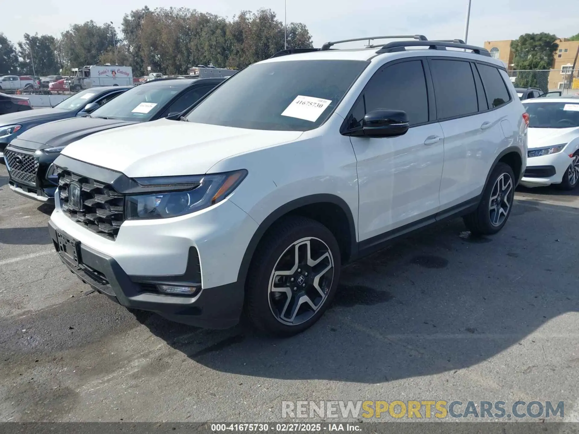 2 Photograph of a damaged car 5FNYF8H07PB010220 HONDA PASSPORT 2023