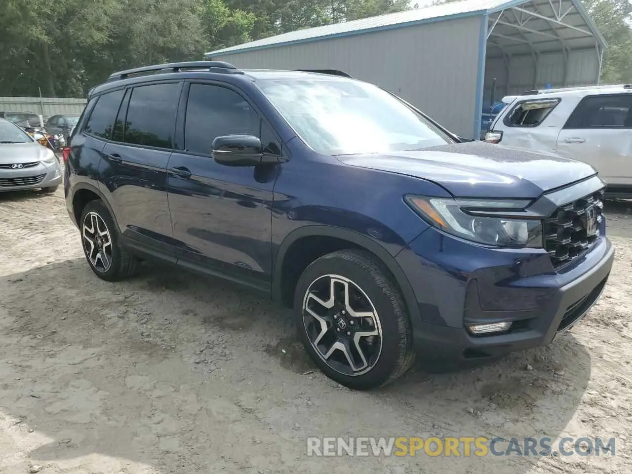 4 Photograph of a damaged car 5FNYF8H07PB036929 HONDA PASSPORT 2023