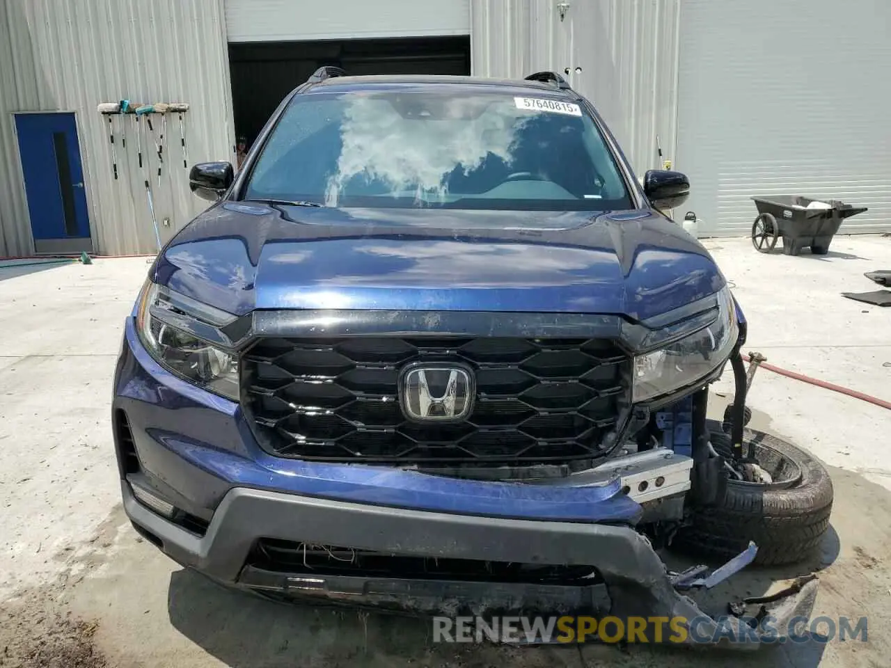 5 Photograph of a damaged car 5FNYF8H0XPB033491 HONDA PASSPORT 2023