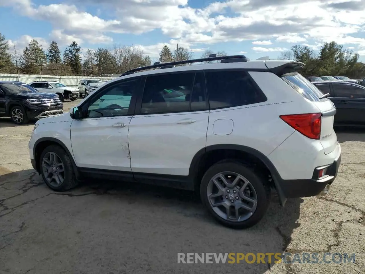 2 Photograph of a damaged car 5FNYF8H50PB016520 HONDA PASSPORT 2023