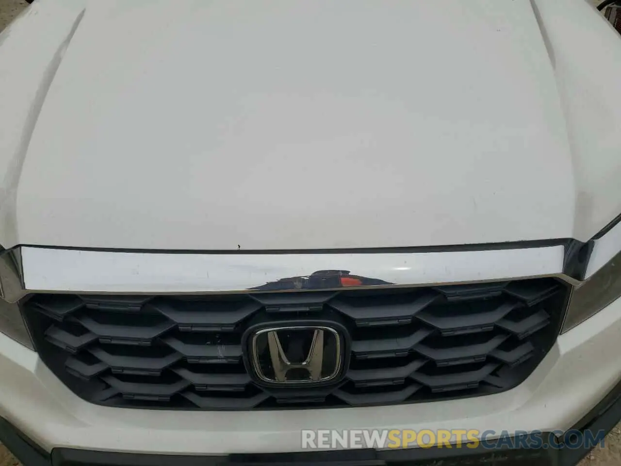 12 Photograph of a damaged car 5FNYF8H51PB033343 HONDA PASSPORT 2023