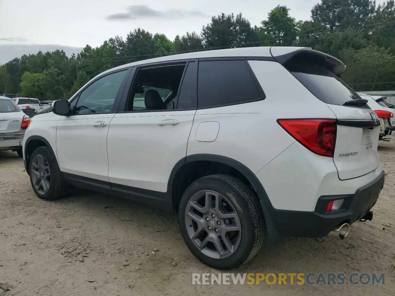 2 Photograph of a damaged car 5FNYF8H51PB033343 HONDA PASSPORT 2023