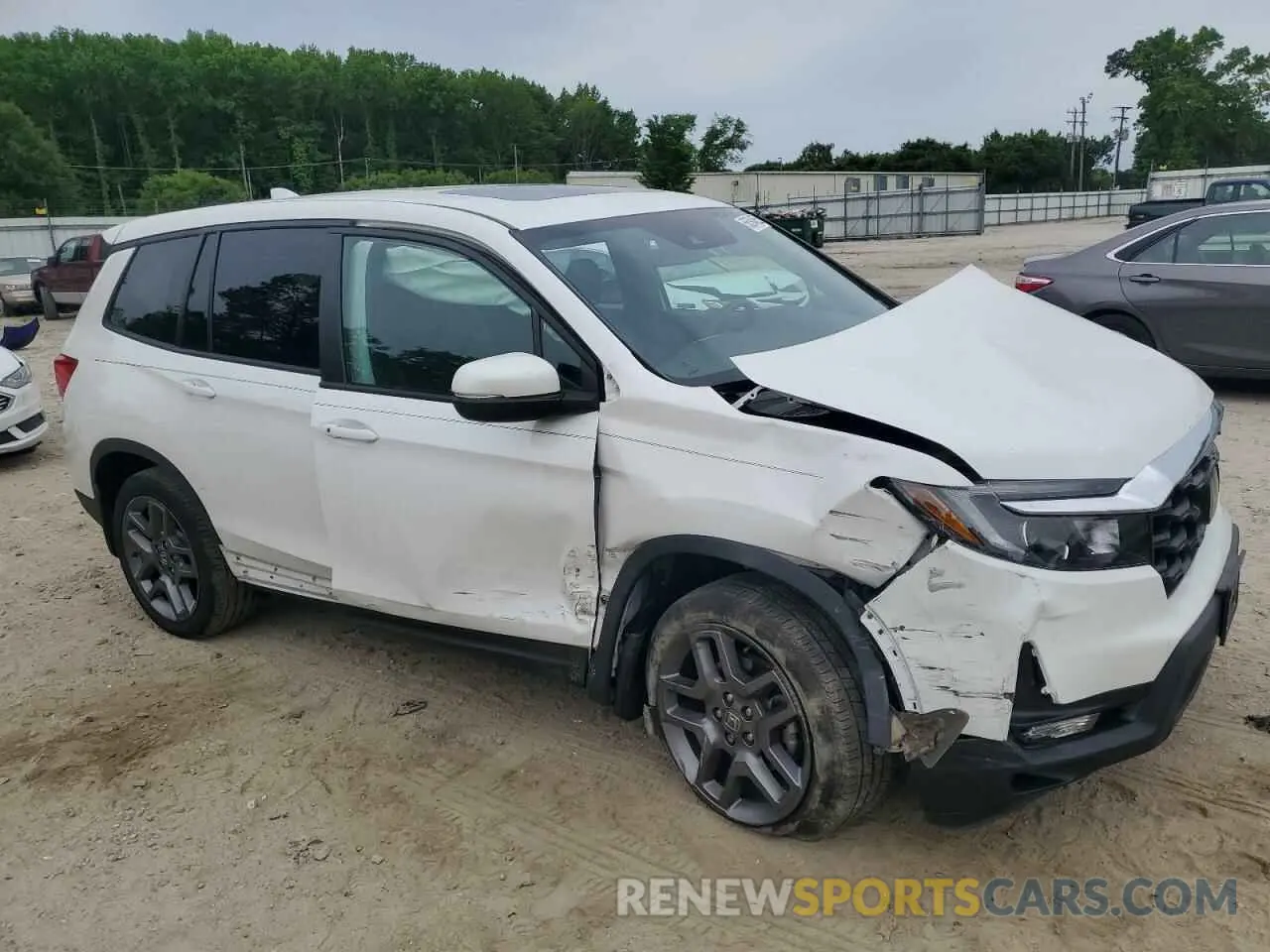 4 Photograph of a damaged car 5FNYF8H51PB033343 HONDA PASSPORT 2023