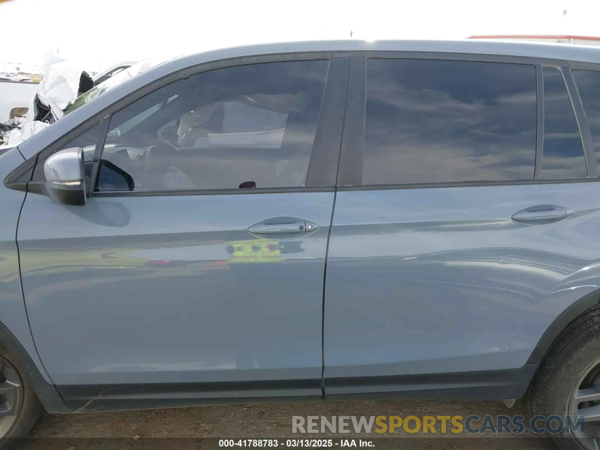 13 Photograph of a damaged car 5FNYF8H52PB027082 HONDA PASSPORT 2023