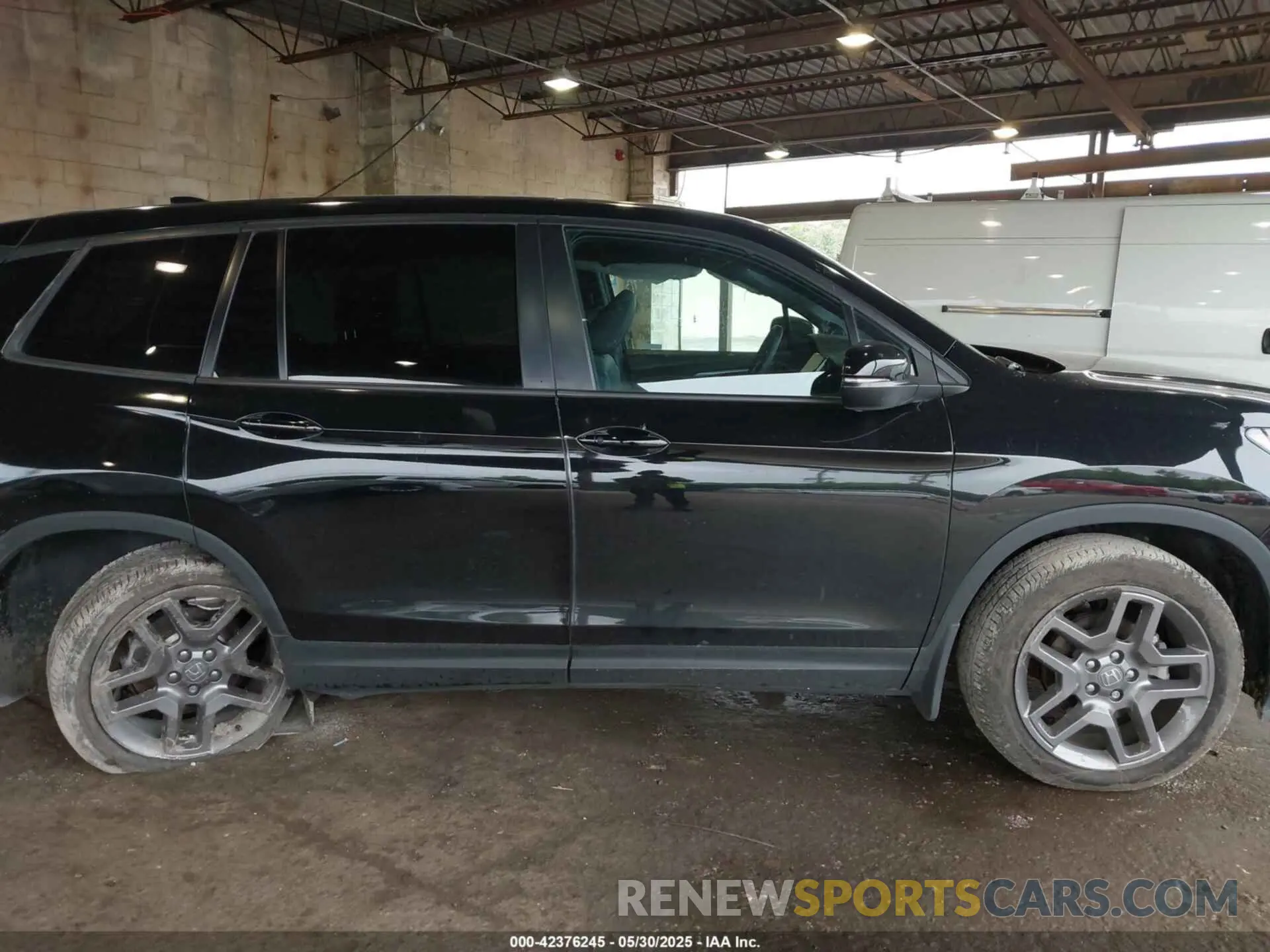 13 Photograph of a damaged car 5FNYF8H52PB033173 HONDA PASSPORT 2023