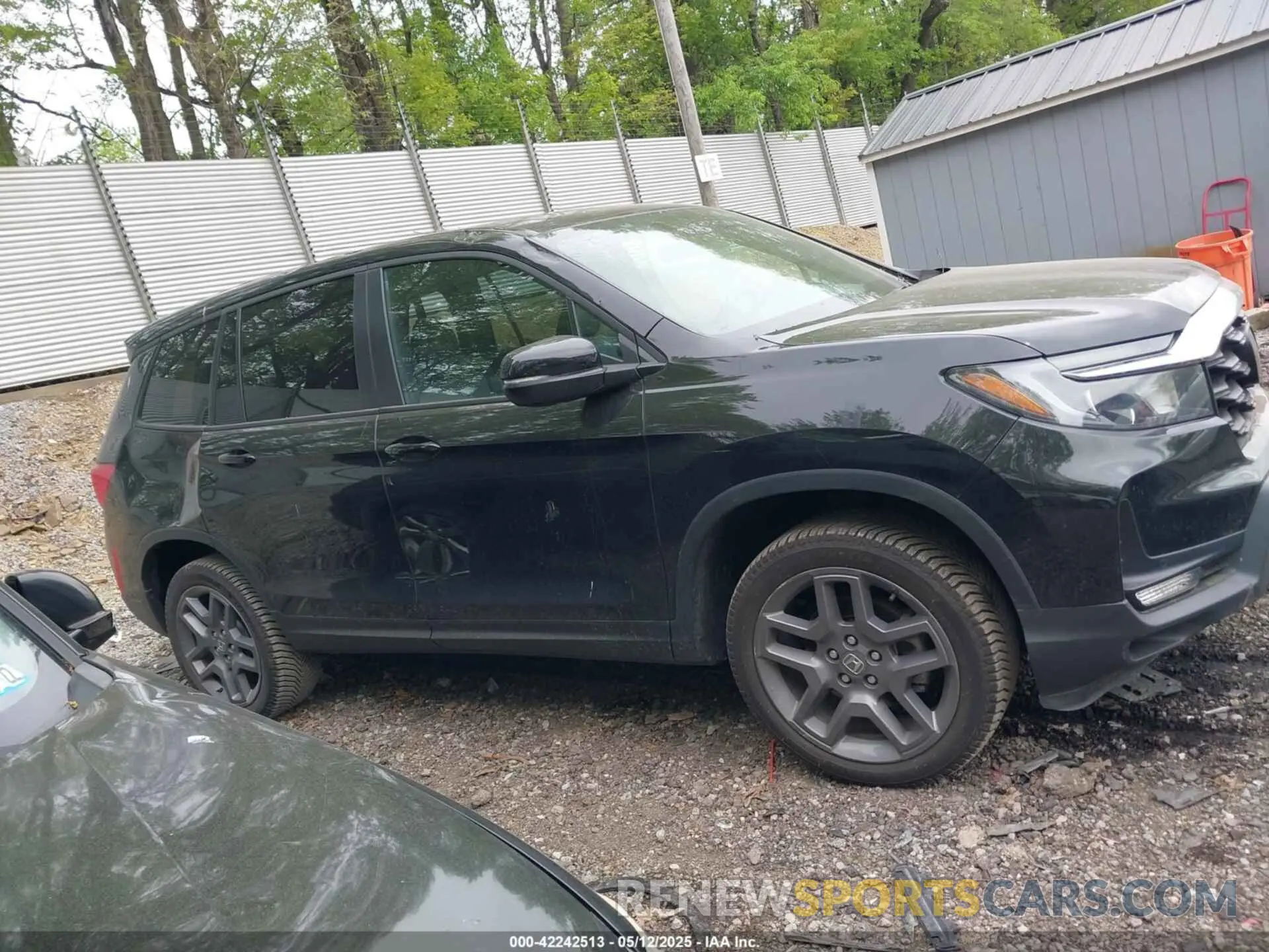 13 Photograph of a damaged car 5FNYF8H53PB011859 HONDA PASSPORT 2023