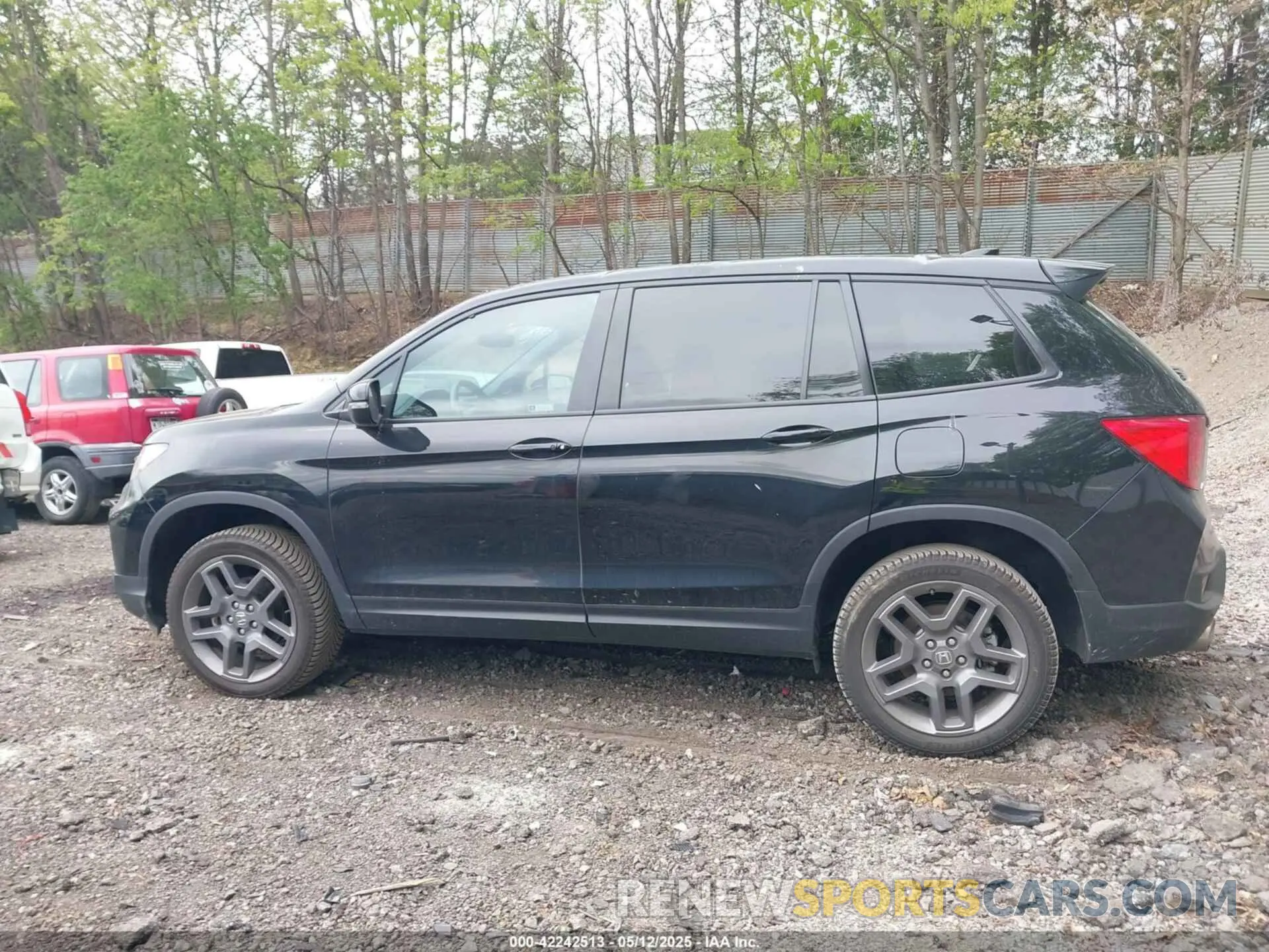 14 Photograph of a damaged car 5FNYF8H53PB011859 HONDA PASSPORT 2023