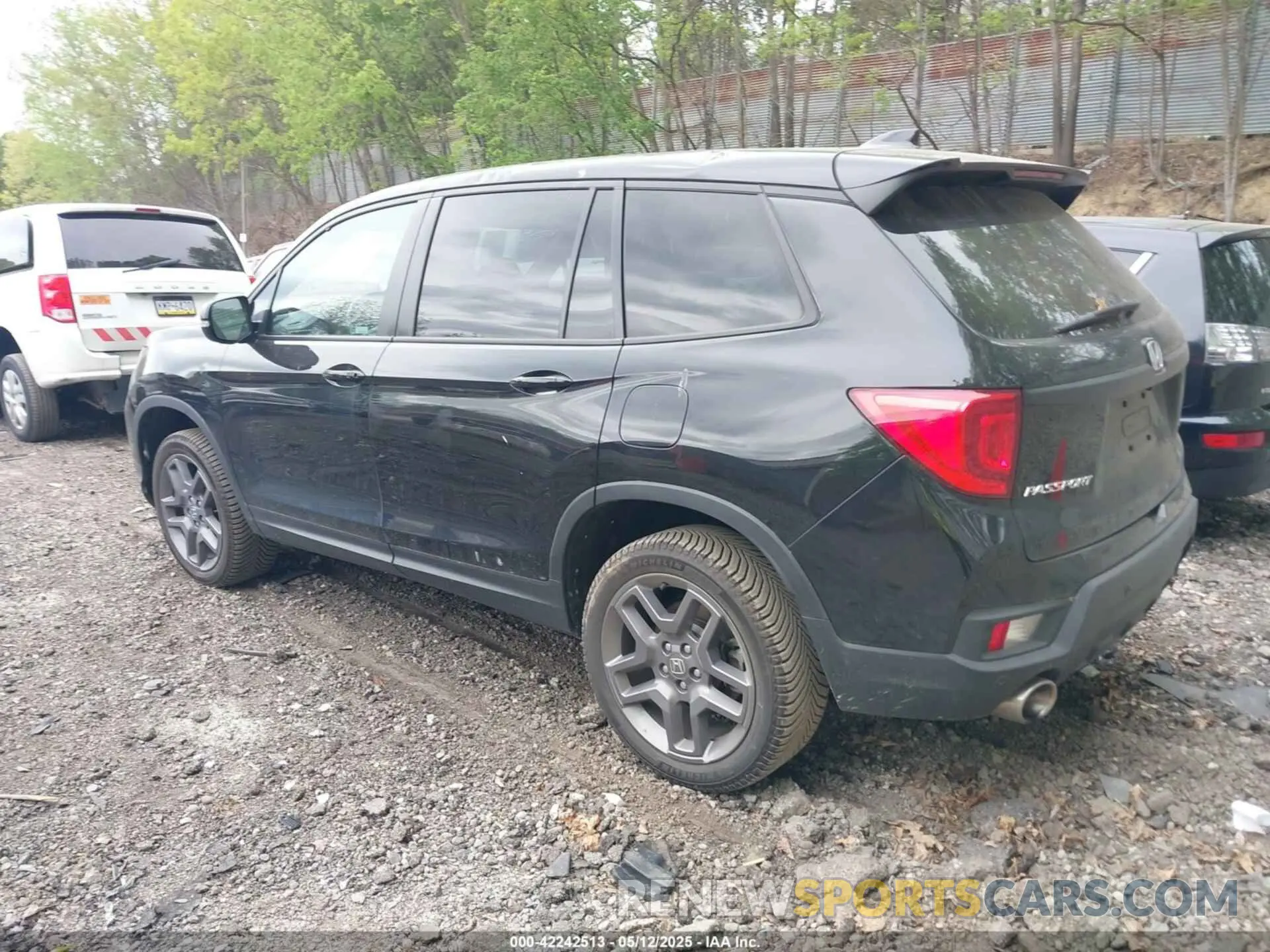 3 Photograph of a damaged car 5FNYF8H53PB011859 HONDA PASSPORT 2023