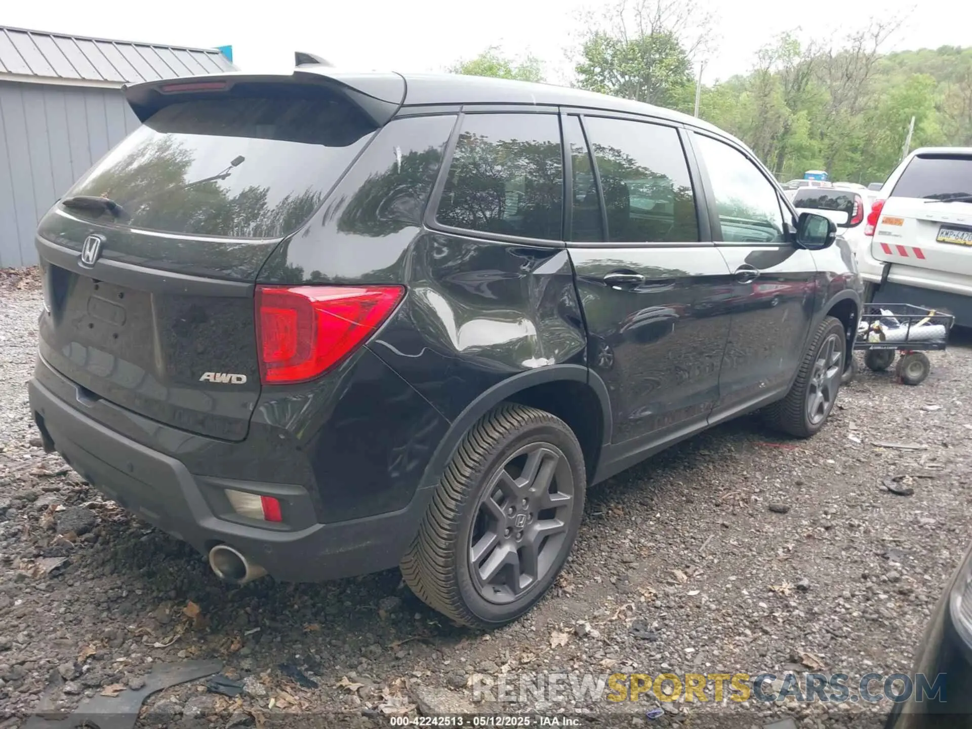 4 Photograph of a damaged car 5FNYF8H53PB011859 HONDA PASSPORT 2023